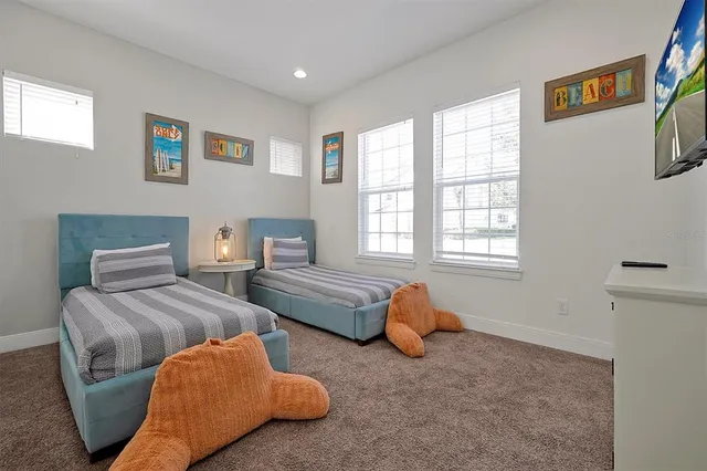 a bathroom with a shower and a toilet