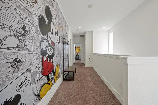 a bathroom with a sink a toilet a mirror a bathtub and shower