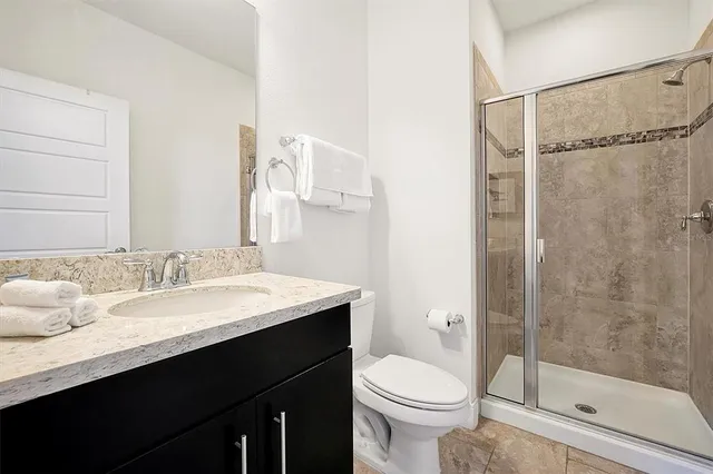 a view of empty room with wooden fence