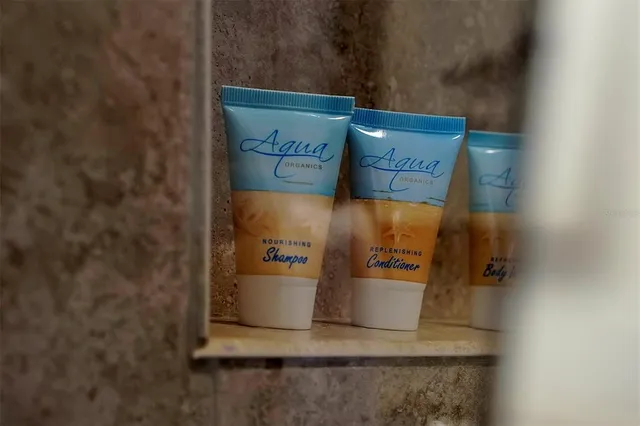 a view of a swimming pool with a yard