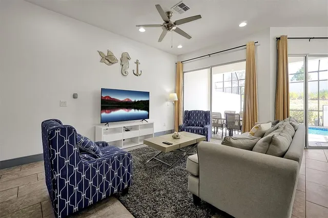 a bathroom with a bathtub and mirror