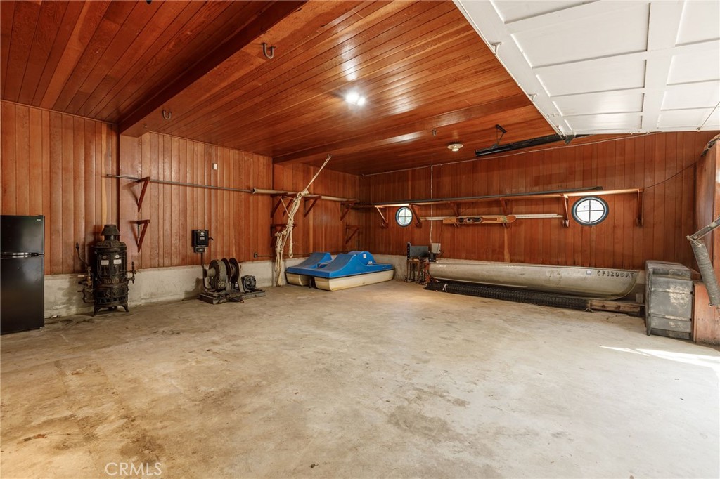 28641 North Shore Road Lake Arrowhead, CA 92352 - Photo 39 of 75 a view of a room with wooden walls