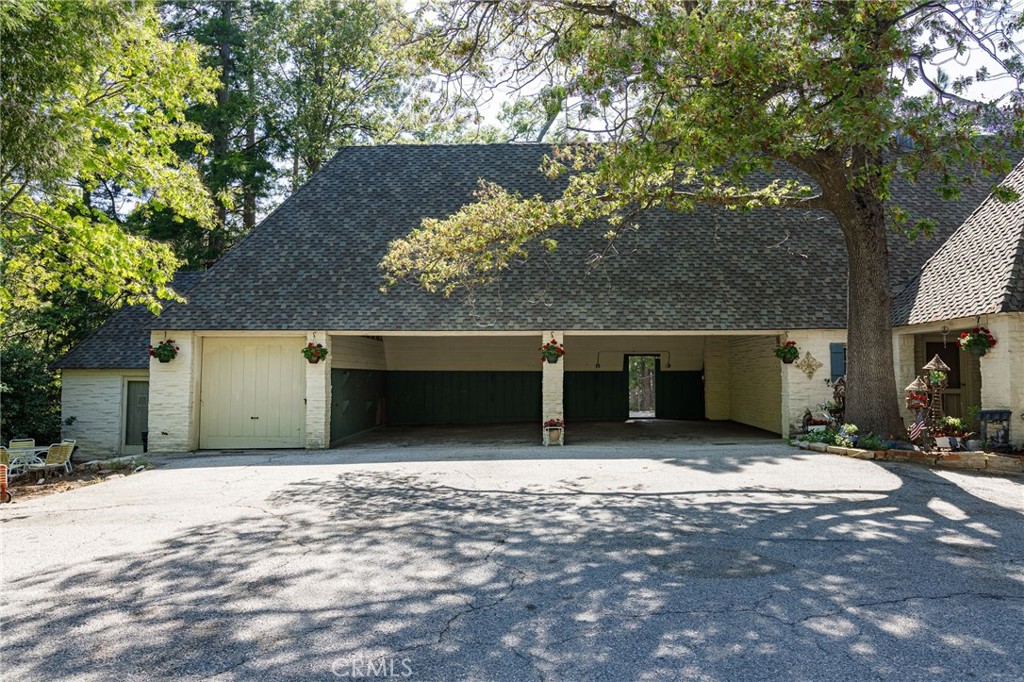 28641 North Shore Road Lake Arrowhead, CA 92352 - Photo 53 of 75 a house view with a outdoor space