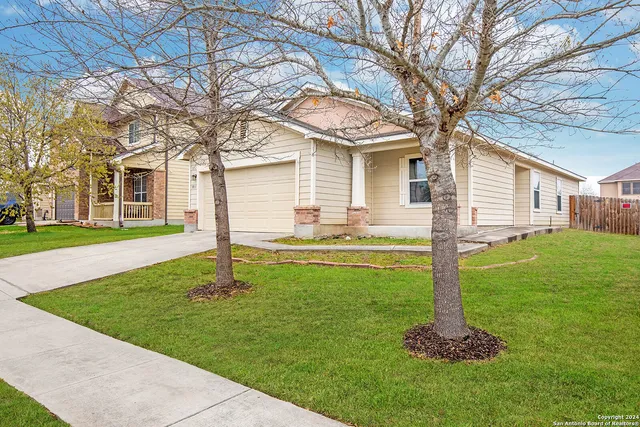 a house view with a garden space