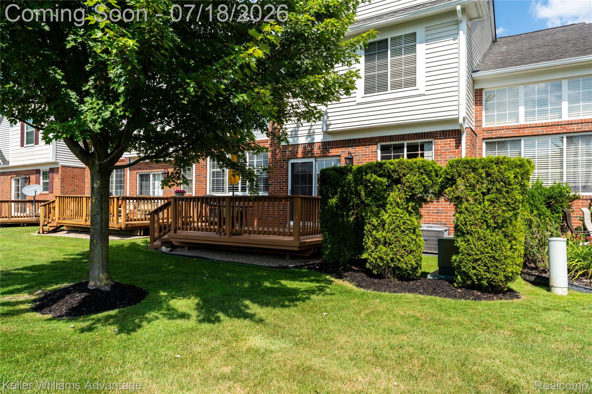 41647 Mitchell Road Novi, MI 48377 - Photo 8 of 43 Expansive green lawn with mature shade tree