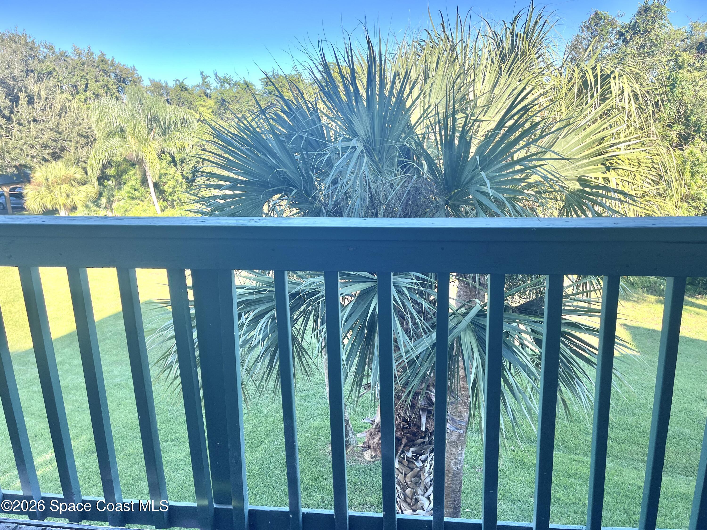 7667 North Wickham Road, Unit 1118 Melbourne, FL 32940 - Photo 8 of 26 a view of a balcony with an outdoor space