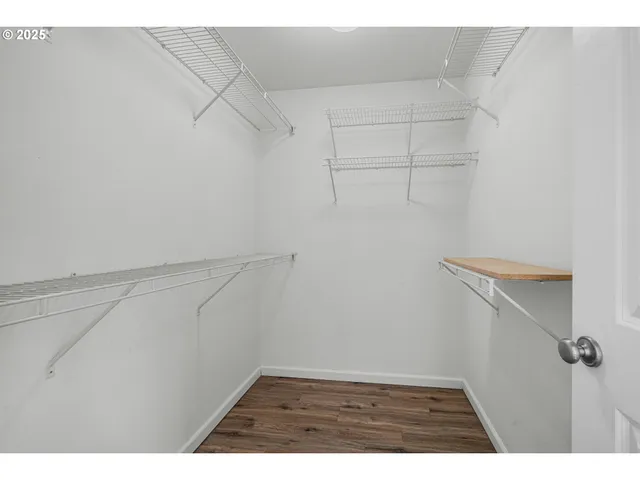 a view of a room with racks on the wall