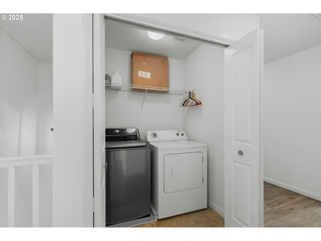 a utility room with dryer and washer