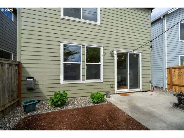 a backyard of a house with seating space