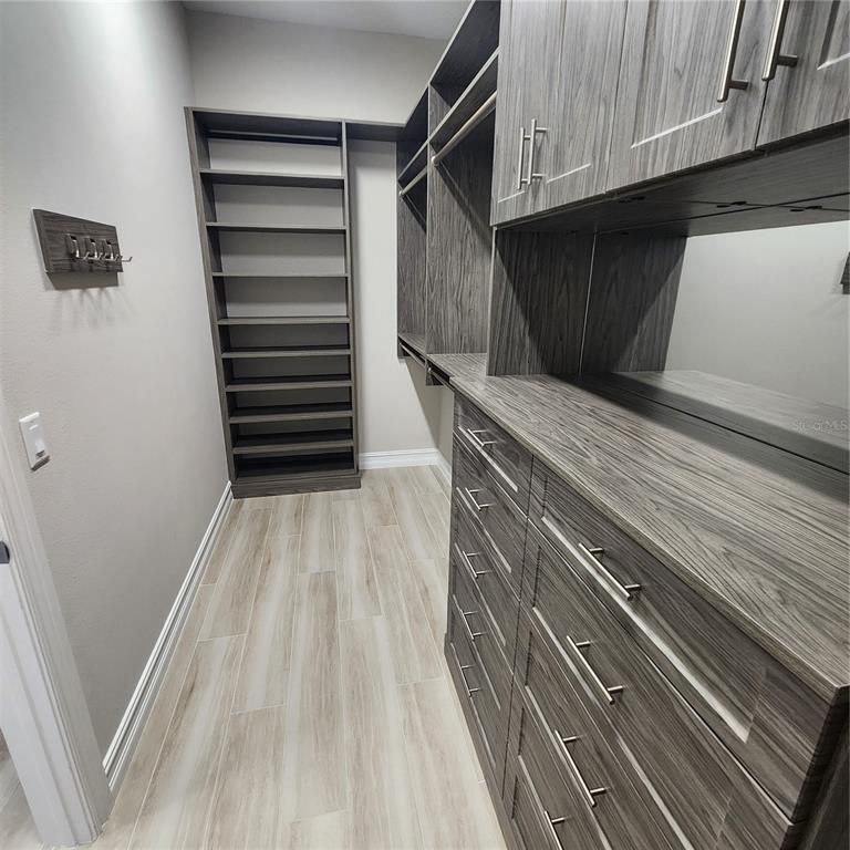 512 Blue Shell Loop Sarasota, FL 34240 - Photo 19 of 44 a view of a walk in closet
