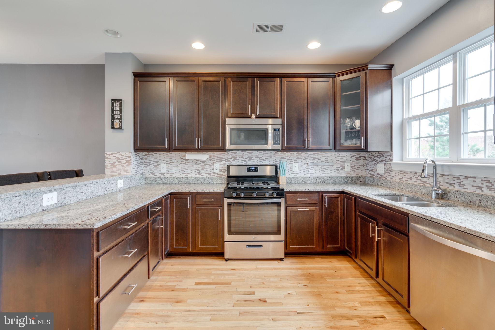 7452 Riding Meadow Way Manassas, VA 20111 - Photo 14 of 48 Stainless Steel appliances / Lots of counterspace