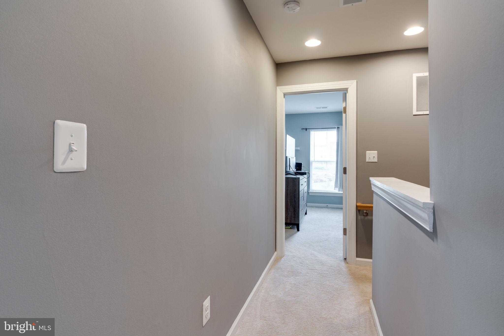 7452 Riding Meadow Way Manassas, VA 20111 - Photo 29 of 48 Hall to second primary suite