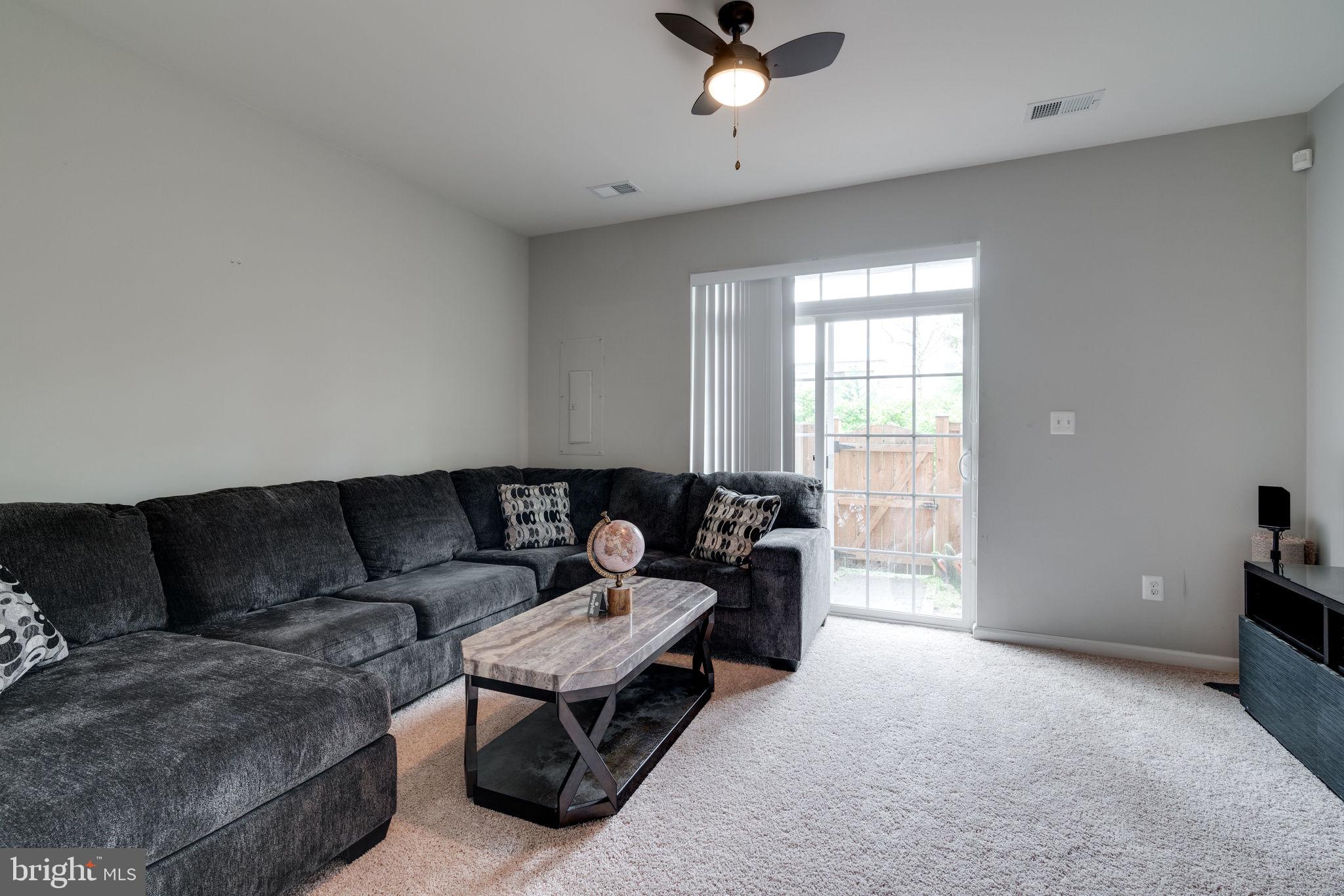 7452 Riding Meadow Way Manassas, VA 20111 - Photo 5 of 48 Ground level living room / possible add'l bedroom