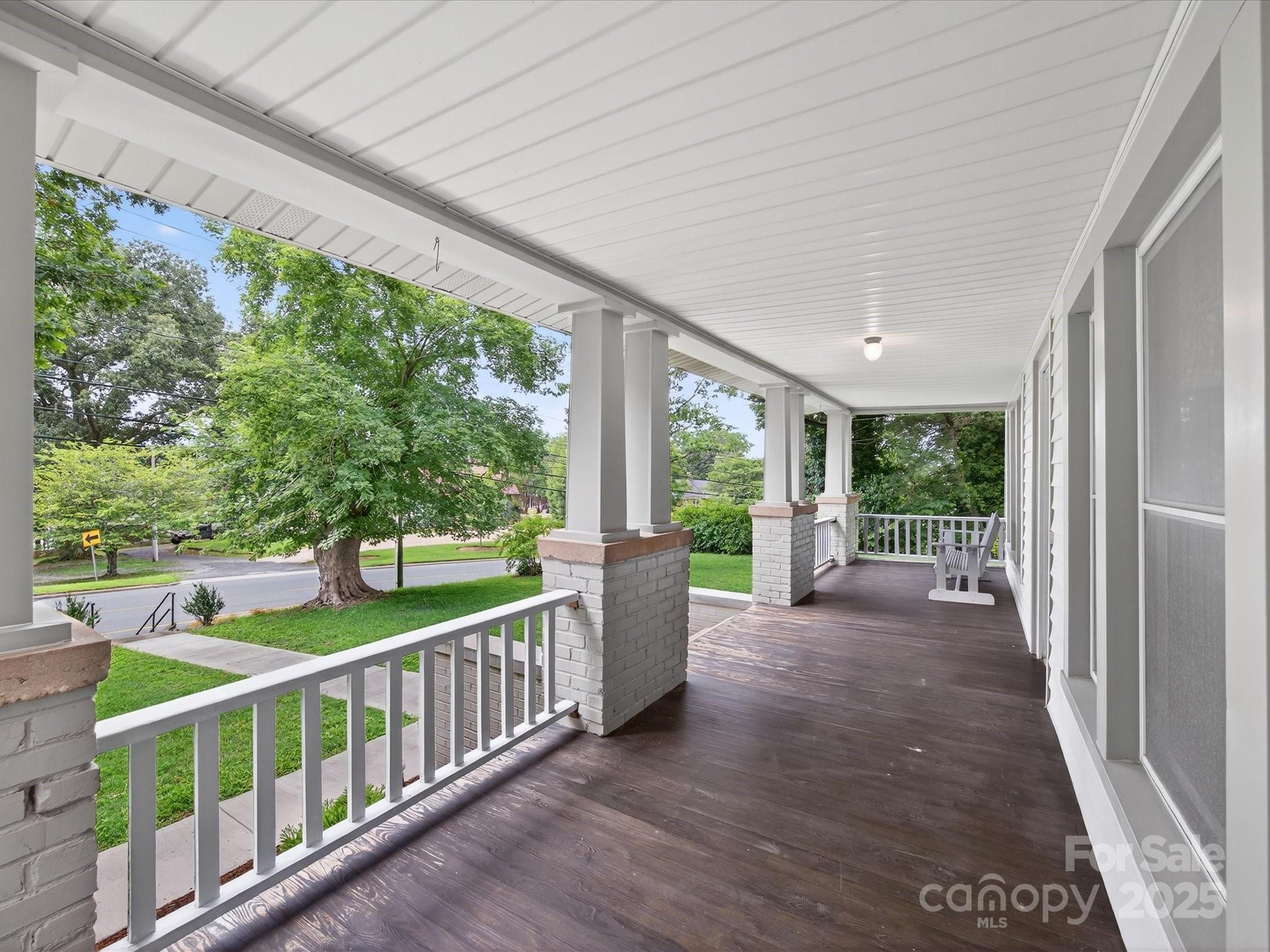 808 West Union Street Morganton, NC 28655 - Photo 14 of 40 a view of a porch with furniture and garden