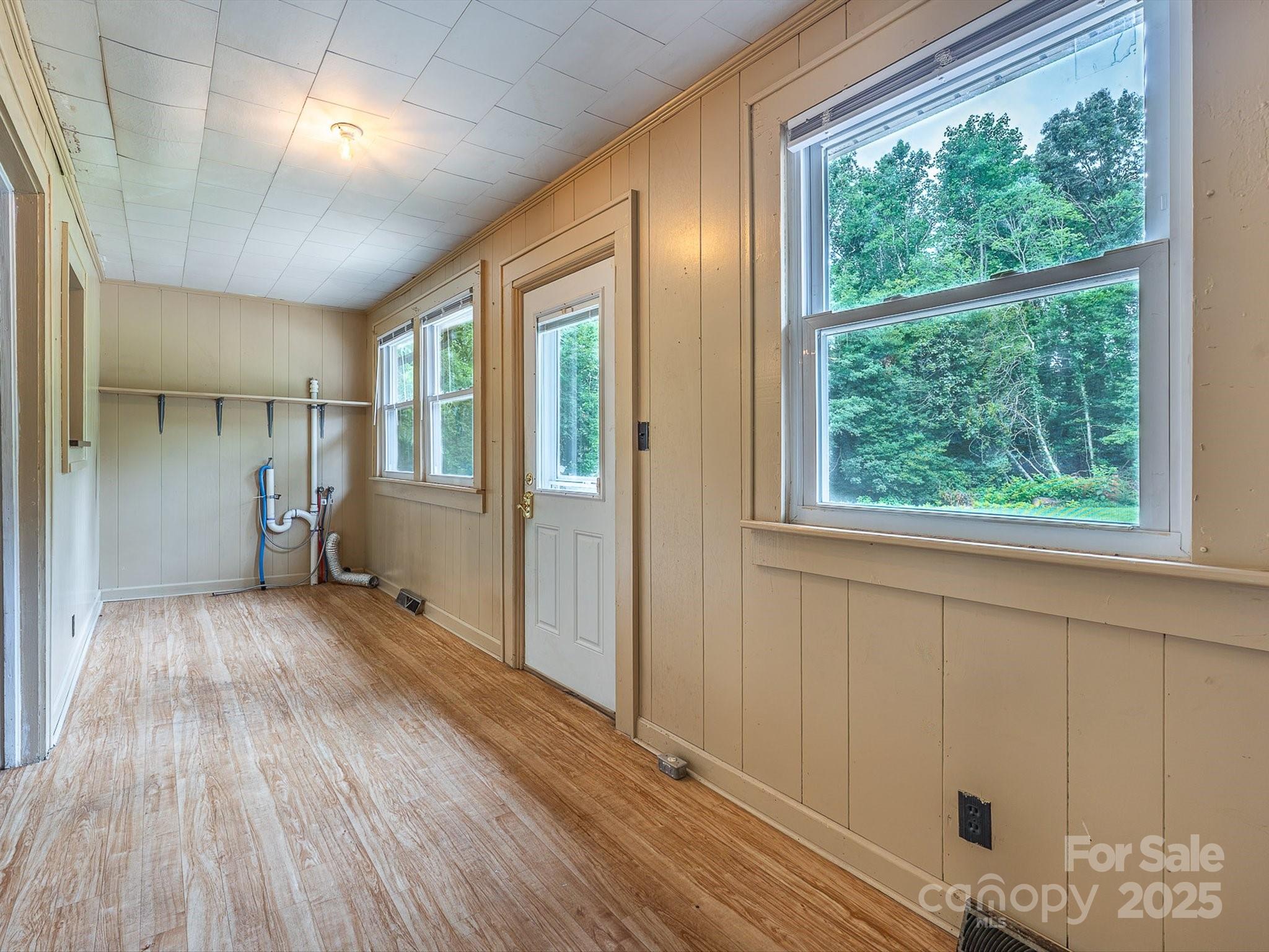 808 West Union Street Morganton, NC 28655 - Photo 37 of 40 a view of hallway with a large window and wooden floor