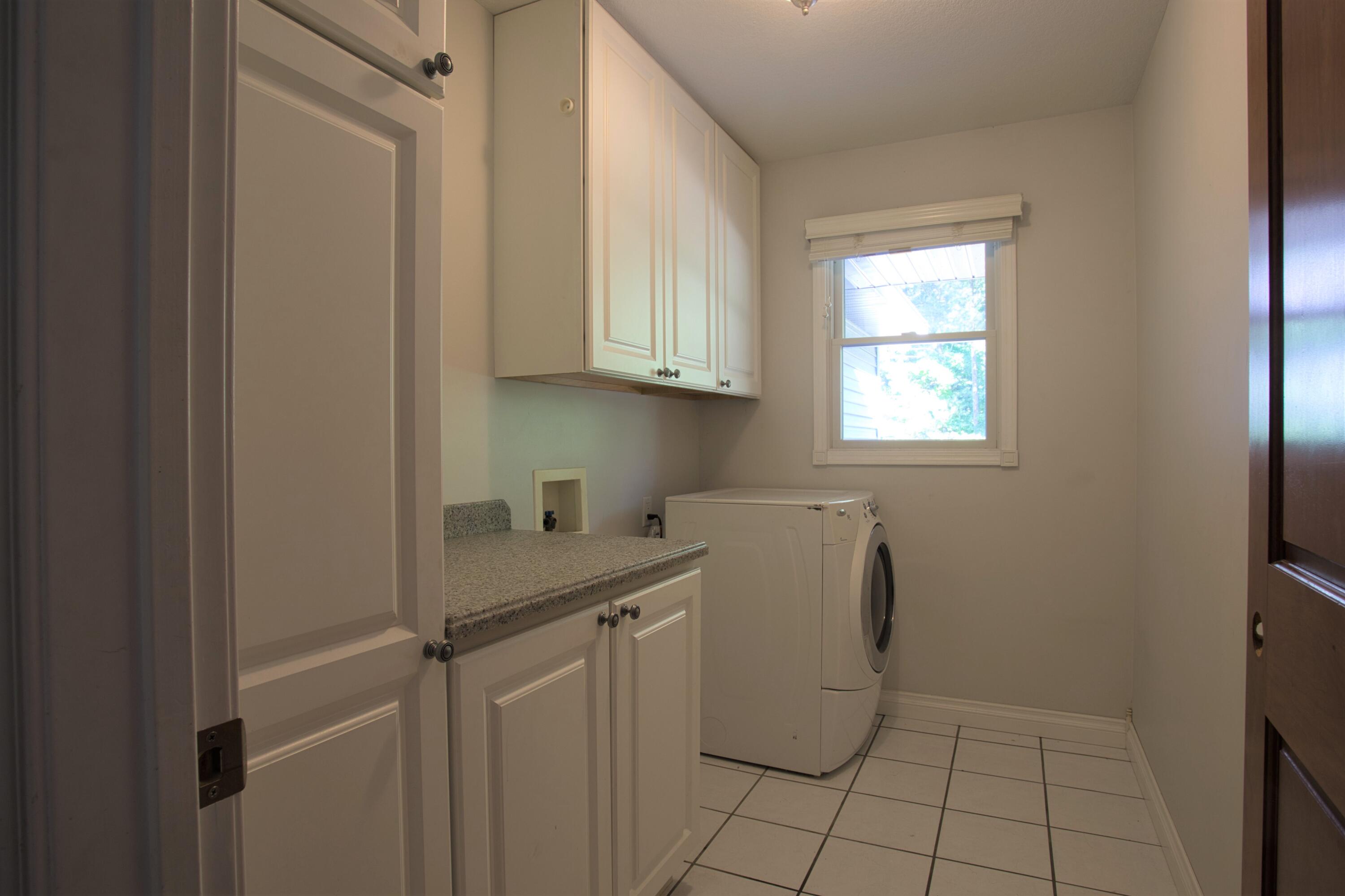 5213 Austin Road Twin Lake, MI 49457 - Photo 15 of 46 main flr laundry