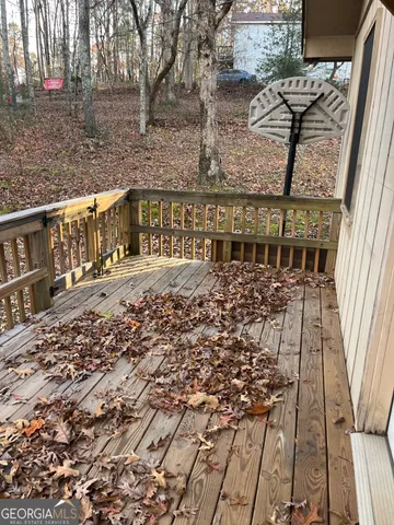 a view of a balcony with chairs