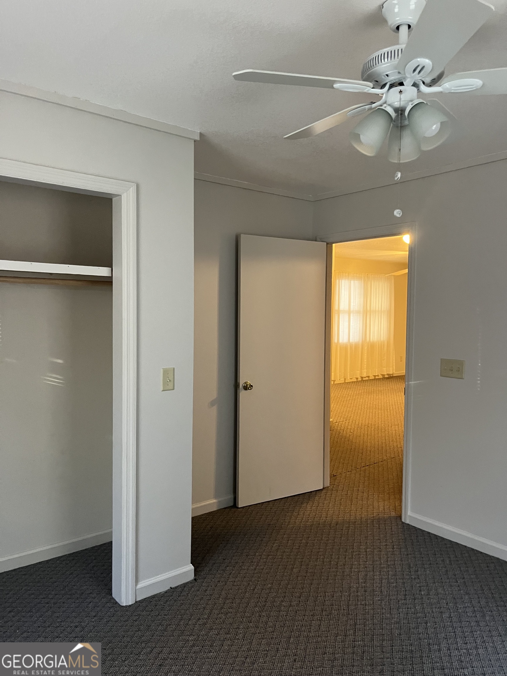 56 Carin Lane Tiger, GA 30576 - Photo 7 of 15 a view of an empty room with wooden floor and a window