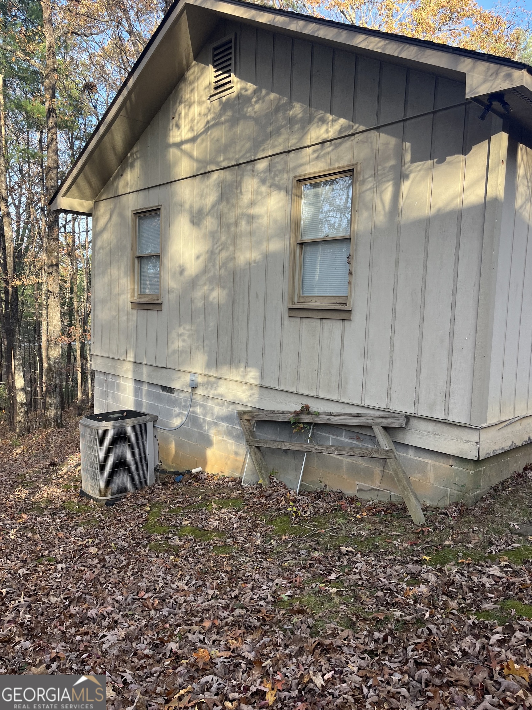 56 Carin Lane Tiger, GA 30576 - Photo 9 of 15 a bathroom with a granite countertop sink and a bathtub