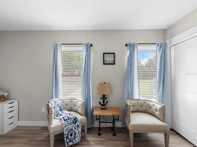 a view of a swimming pool with a porch