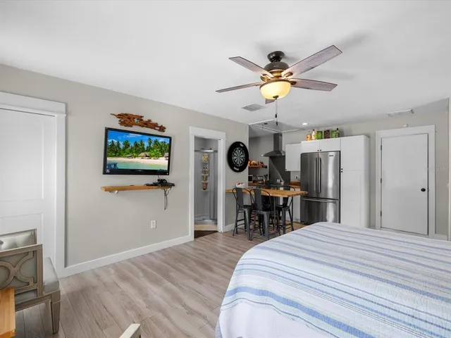 a view of a backyard with sitting area