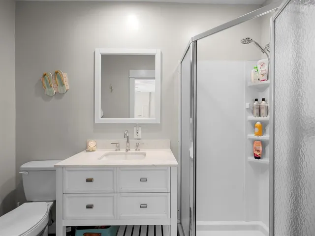 an aerial view of house with yard