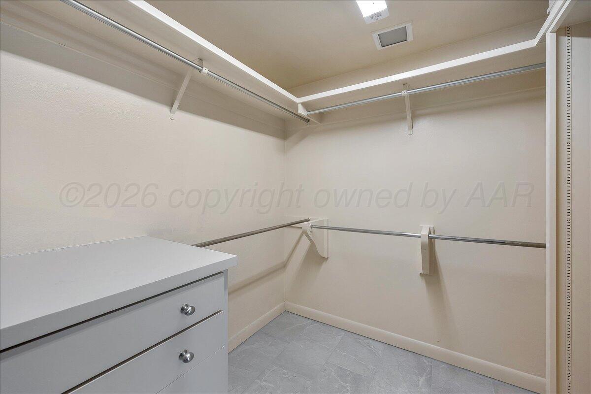 2028 South Austin Street, Unit 907 Amarillo, TX 79109 - Photo 21 of 39 a view of an empty walk in closet