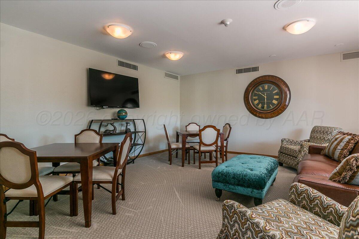 2028 South Austin Street, Unit 907 Amarillo, TX 79109 - Photo 34 of 39 a view of a livingroom with furniture and a flat screen tv