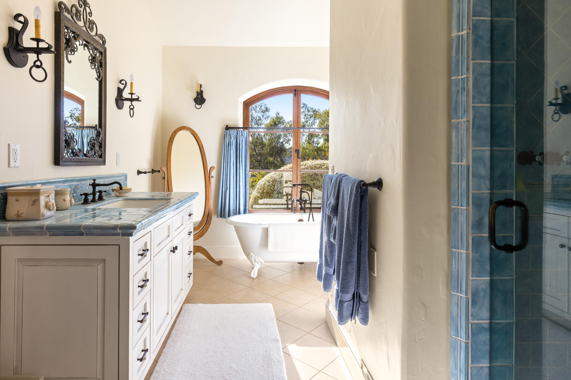 1220 Franklin Ranch Road Goleta, CA 93117 - Photo 12 of 30 a spacious bathroom with a granite countertop sink and a mirror