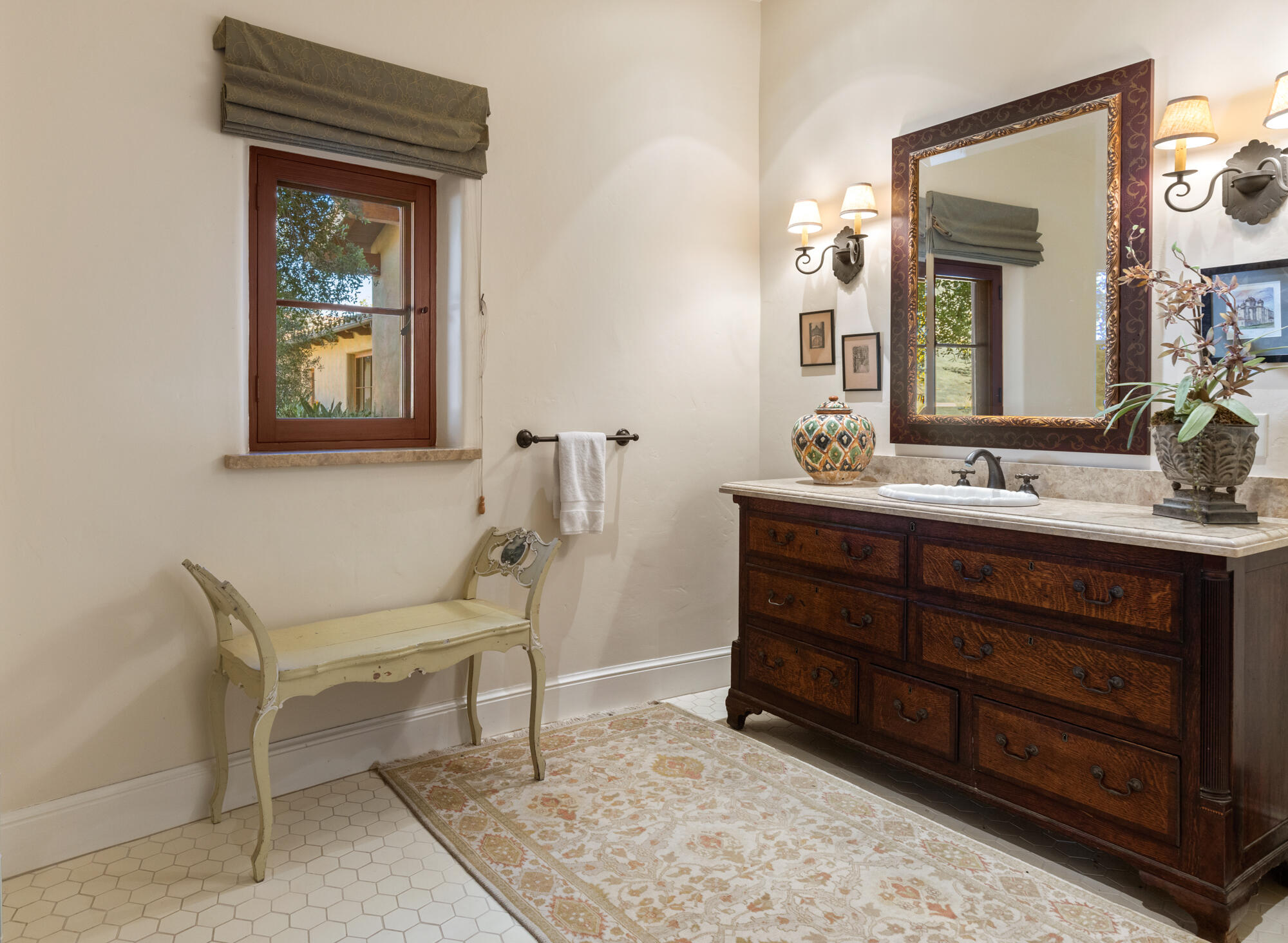 1220 Franklin Ranch Road Goleta, CA 93117 - Photo 14 of 30 a bathroom with a sink and a mirror