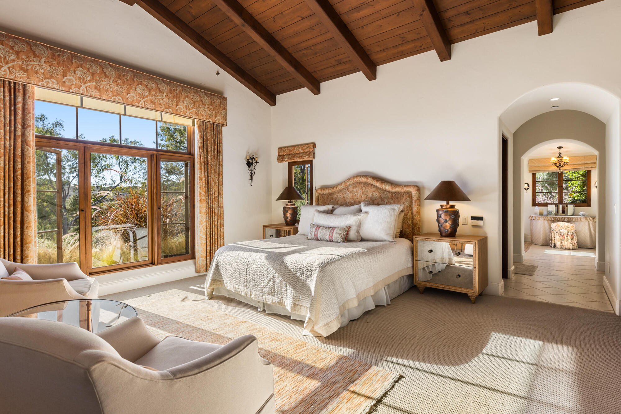 1220 Franklin Ranch Road Goleta, CA 93117 - Photo 16 of 30 a spacious bedroom with a large bed and a large window