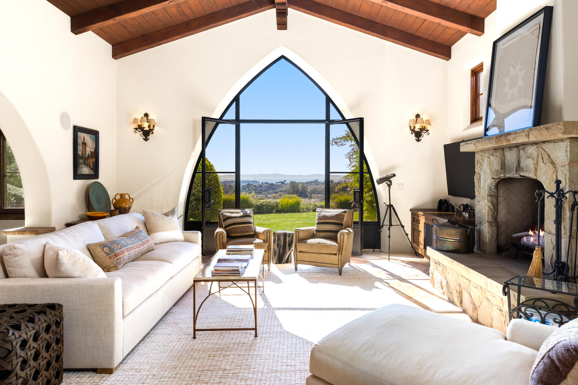 1220 Franklin Ranch Road Goleta, CA 93117 - Photo 3 of 30 a living room with fireplace furniture and a floor to ceiling window