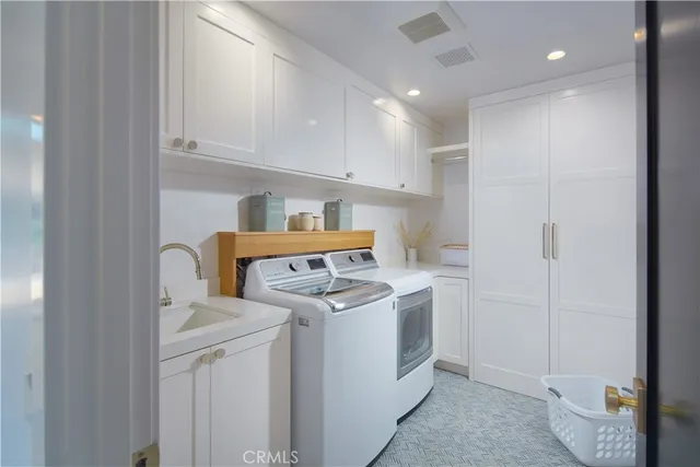 a view of a terrace with couches and sky view