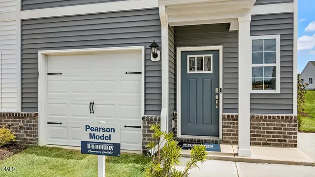 a front view of a house with street
