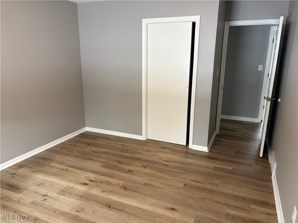 7817 Dalebrook Road Independence, OH 44131 - Photo 22 of 28 Unfurnished bedroom featuring hardwood / wood-style flooring