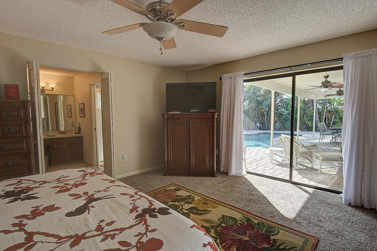 4410 Brandywine Drive Boca Raton, FL 33487 - Photo 13 of 27 Master Bedroom with Pool View
