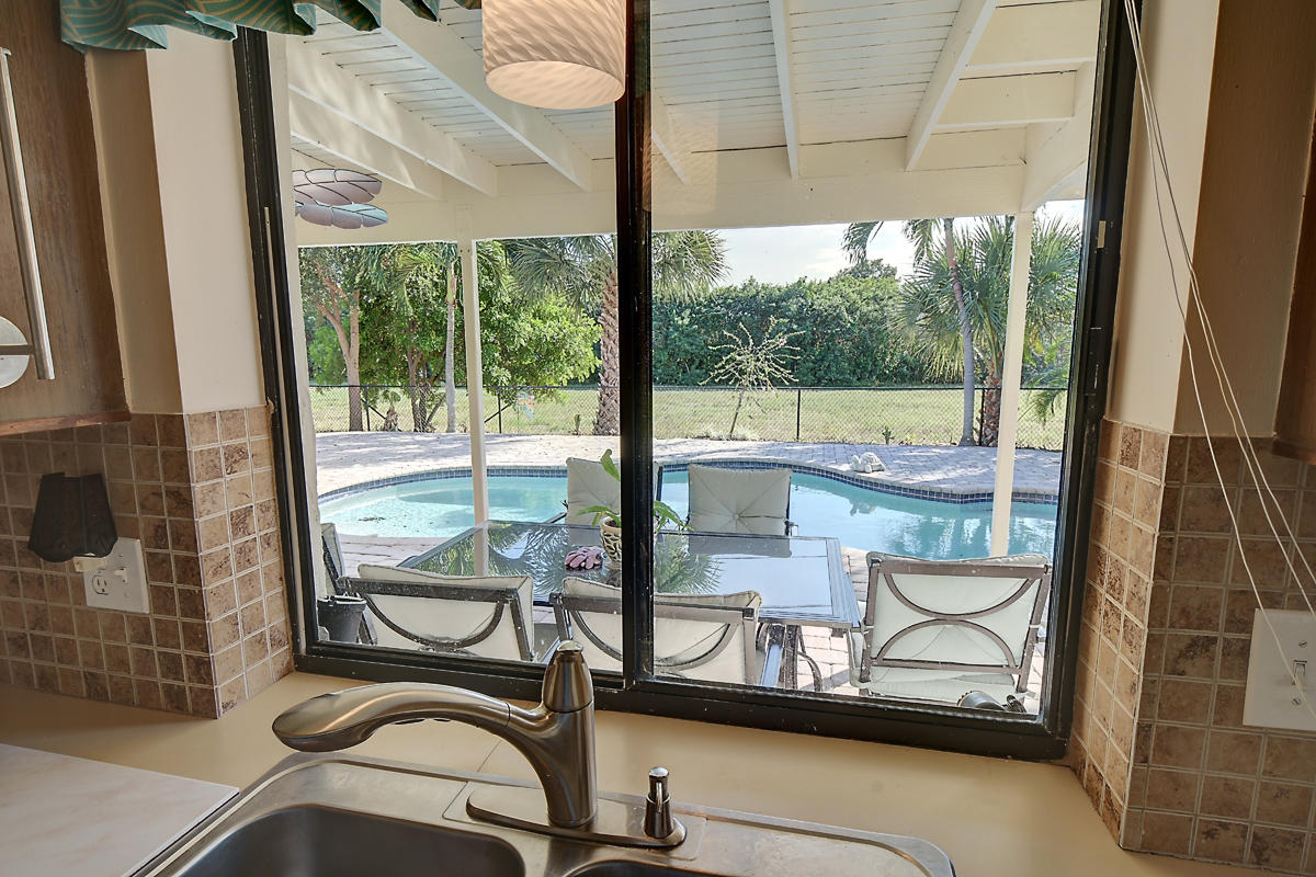 4410 Brandywine Drive Boca Raton, FL 33487 - Photo 22 of 27 Kitchen View of Pool