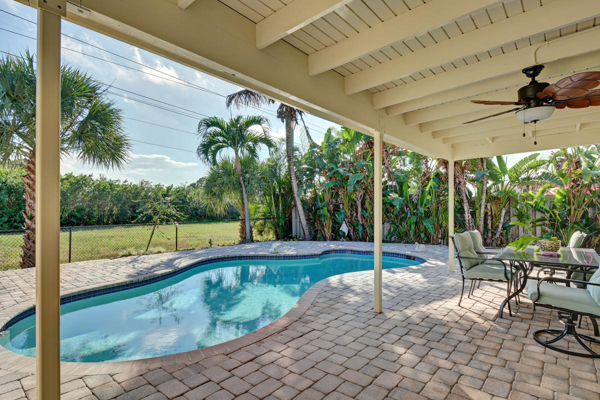 4410 Brandywine Drive Boca Raton, FL 33487 - Photo 6 of 27 Freeform Pool and Covered Patio