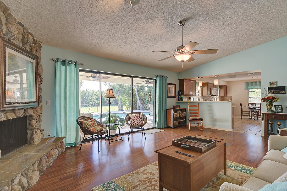 4410 Brandywine Drive Boca Raton, FL 33487 - Photo 7 of 27 Family Room with View of Pool