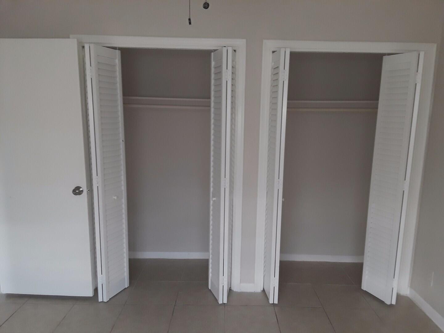 875 Southwest 4th Court, Unit 2 Boca Raton, FL 33432 - Photo 4 of 12 a view of an empty room