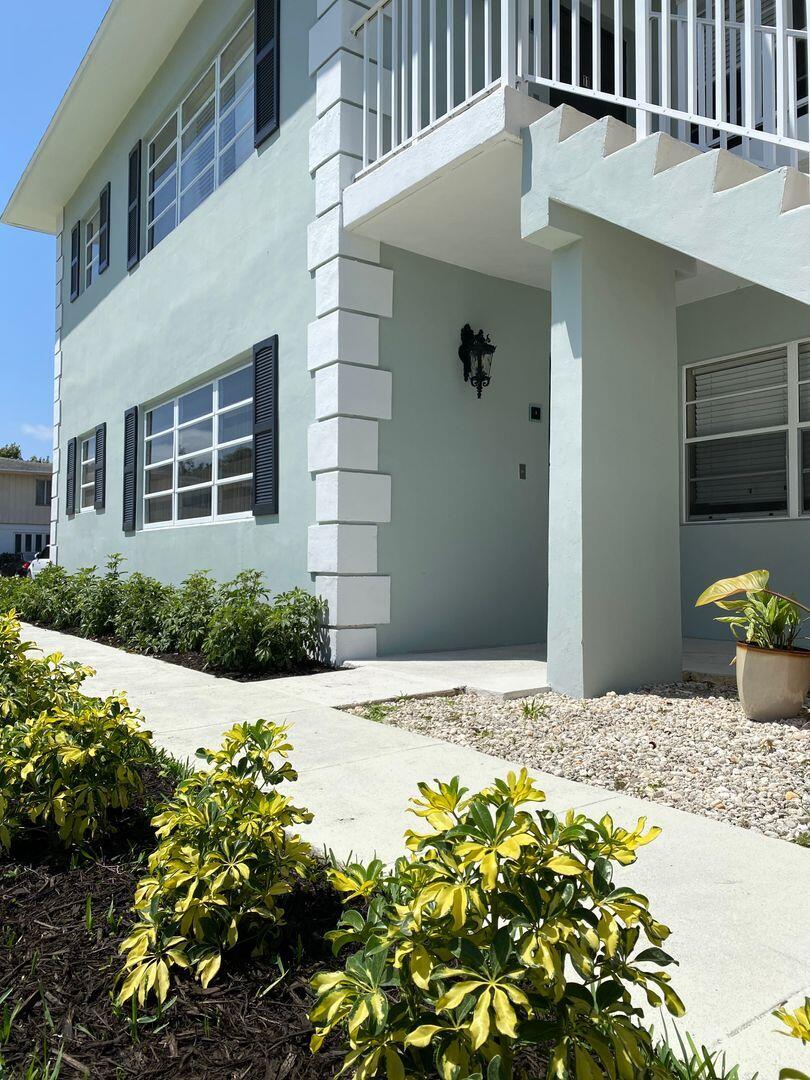 875 Southwest 4th Court, Unit 2 Boca Raton, FL 33432 - Photo 6 of 12 a front view of a house