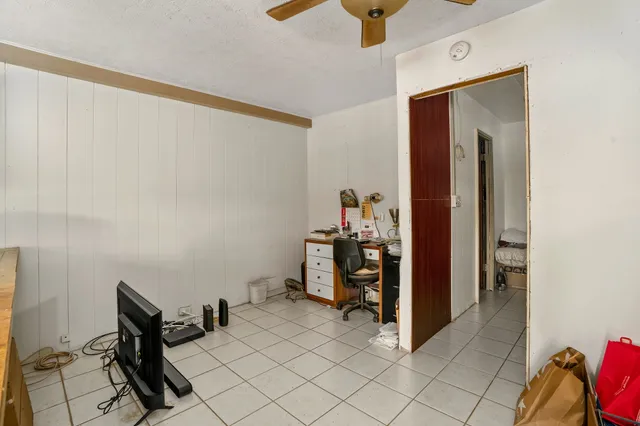 a view of room with furniture and closet