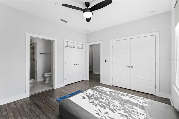 a living room with a rug and a rug