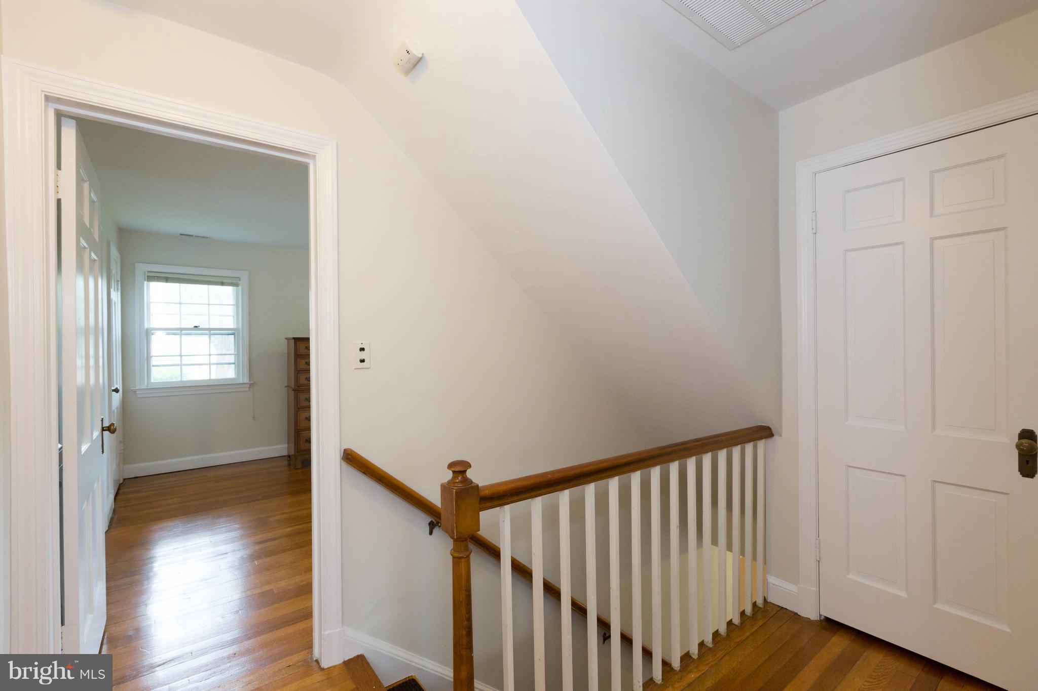 9600 Sutherland Road Silver Spring, MD 20901 - Photo 15 of 30 a view of a hallway with wooden floor