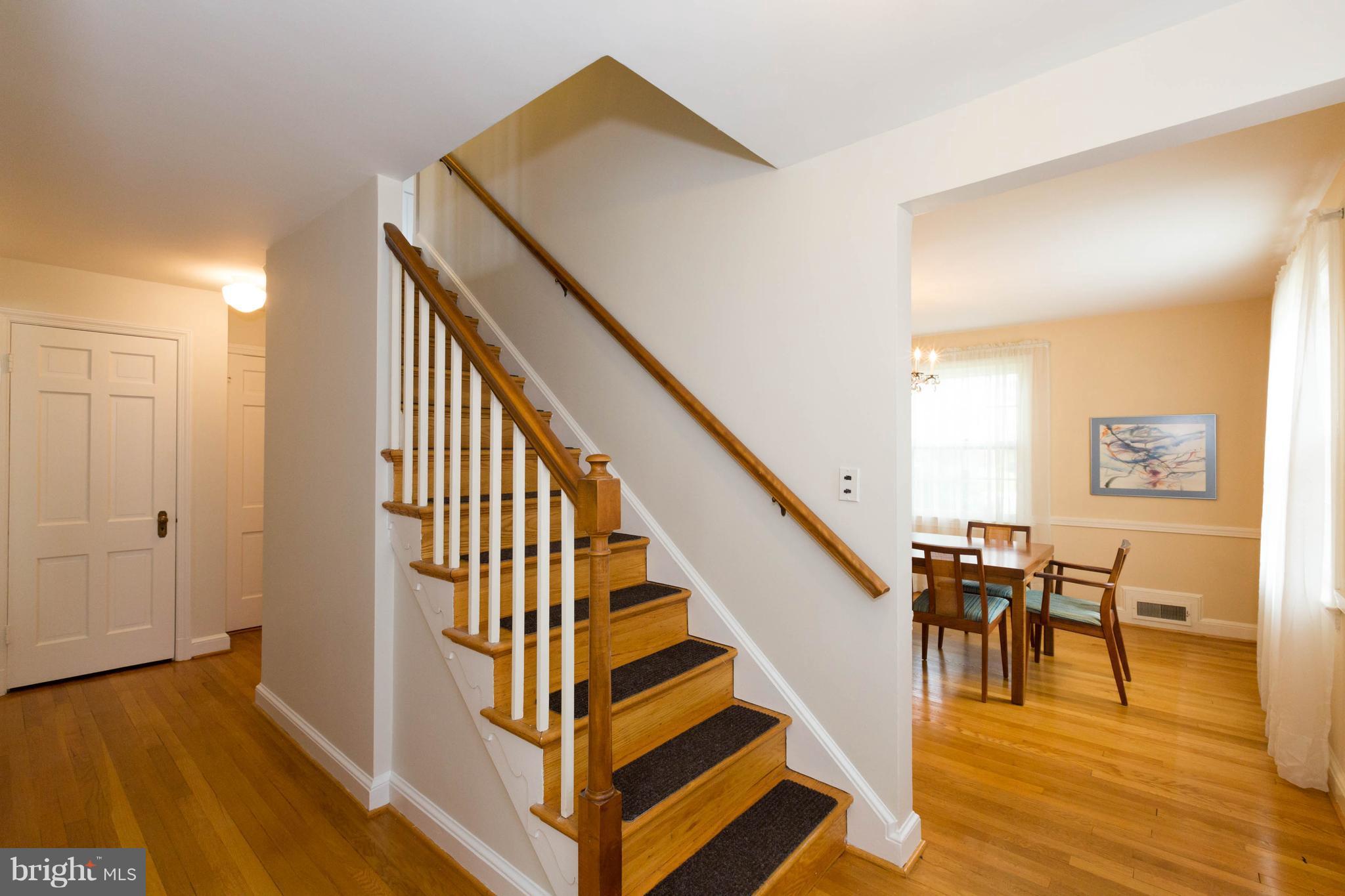 9600 Sutherland Road Silver Spring, MD 20901 - Photo 3 of 30 a view of entryway and hall with wooden floor