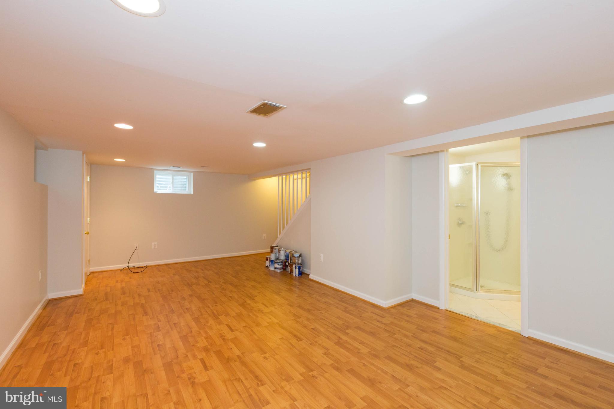 9600 Sutherland Road Silver Spring, MD 20901 - Photo 26 of 30 a view of empty room with wooden floor