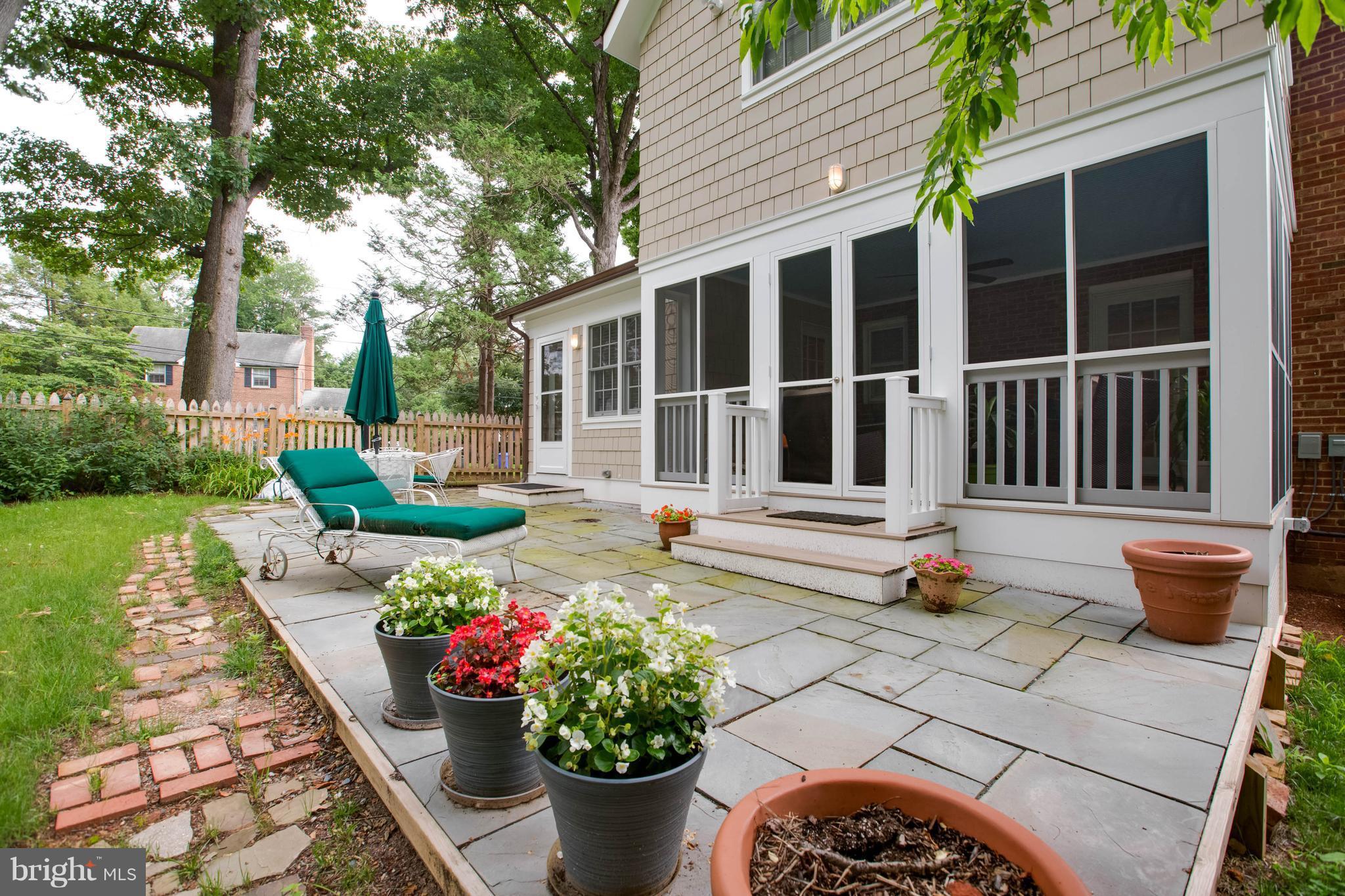 9600 Sutherland Road Silver Spring, MD 20901 - Photo 29 of 30 a view of a garden with chairs and plants