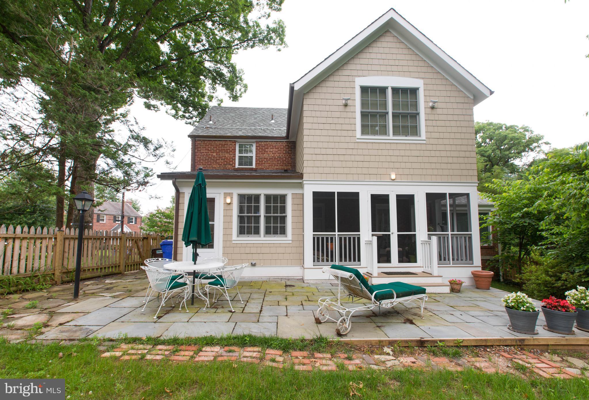 9600 Sutherland Road Silver Spring, MD 20901 - Photo 30 of 30 a view of a house with a patio