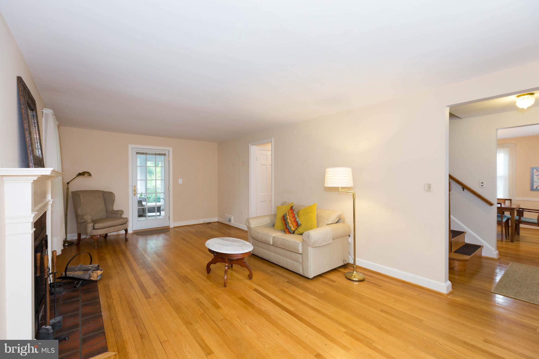 9600 Sutherland Road Silver Spring, MD 20901 - Photo 4 of 30 a bedroom with furniture and a wooden floor
