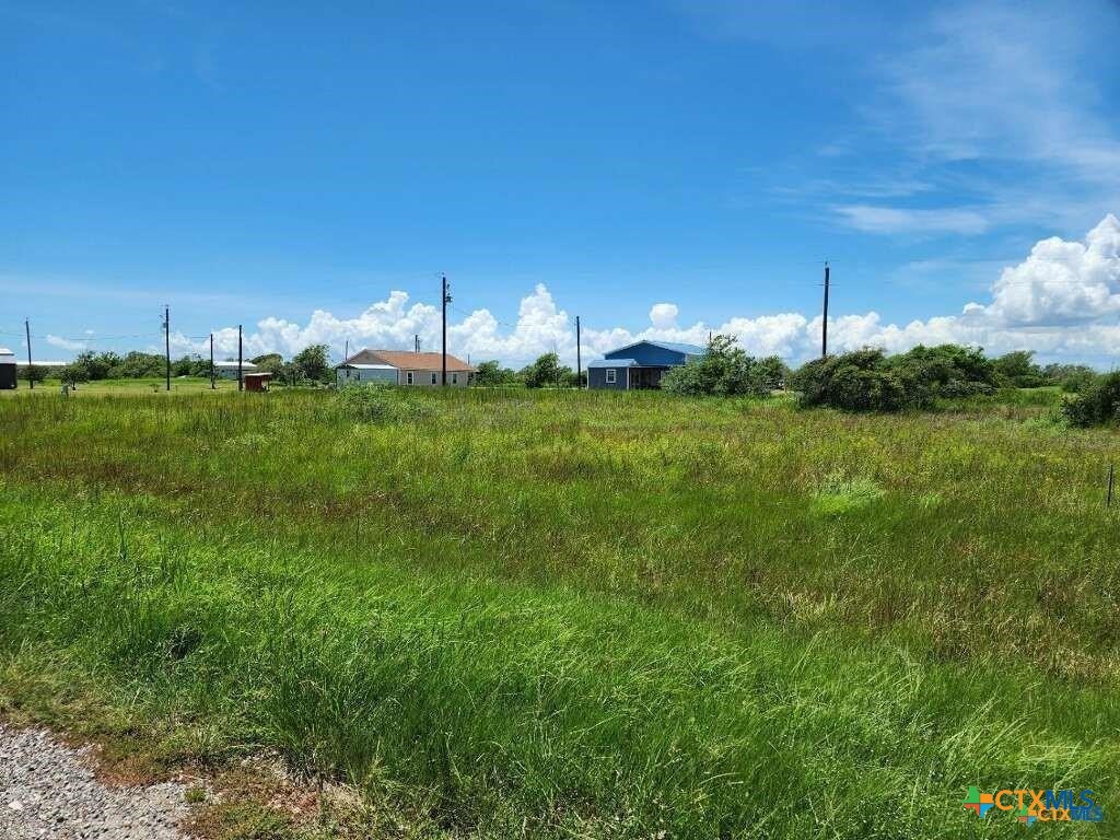 78 Redfish Lane Palacios, TX 77465 - Photo 2 of 7 a view of a yard